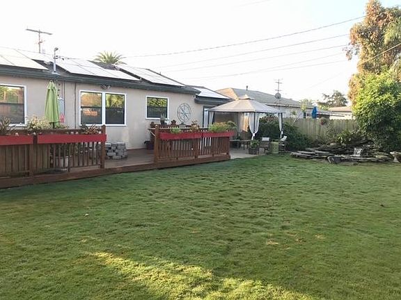 Wood deck with gas fire-pit and hot-tub