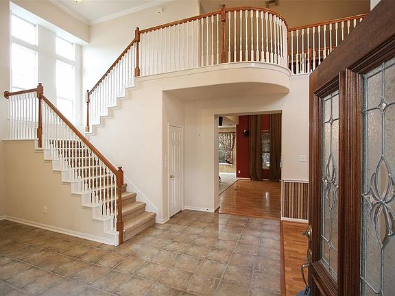 Downstairs is all tile and hardwood flooring. The high ceilings and open plan give a nice spacious feel.