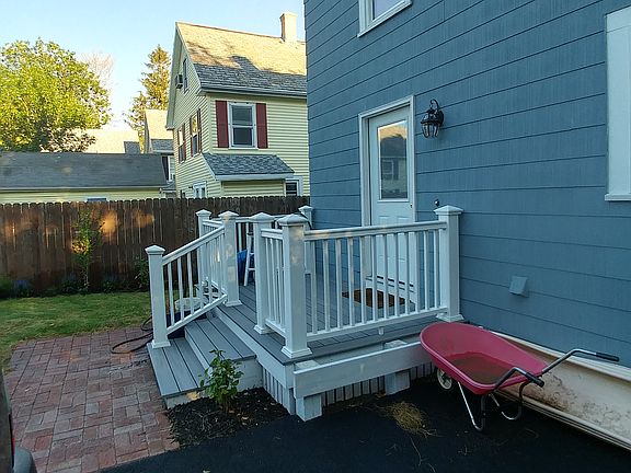 Rear deck, brick patio & driveway for 2 cars