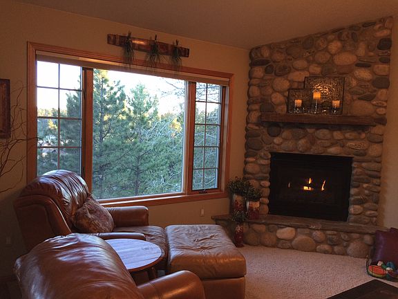 Living room w/River Rock FP