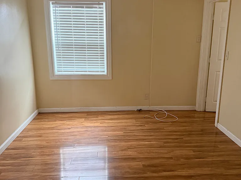Room for rent, looking South towards front of house. Cable & internet hookups. New blinds.
