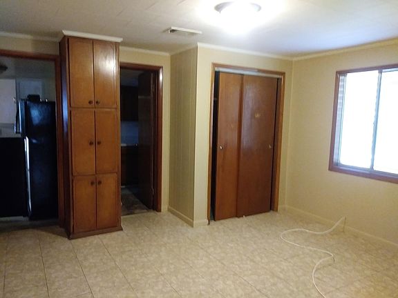 Bedroom with entry to full bath.