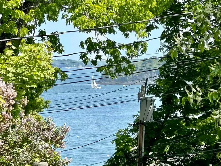 Ocean view from side lawn fence.