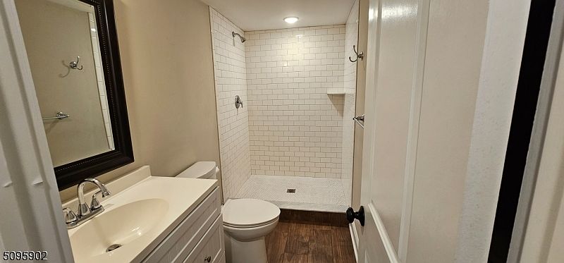 Bathroom. Renovated in farmhouse style with huge shower (no tub).