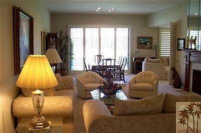 The living room looking towards its fine dining area