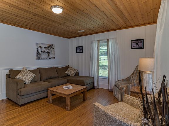 Gorgeous ceiling paneling in this cozy living room