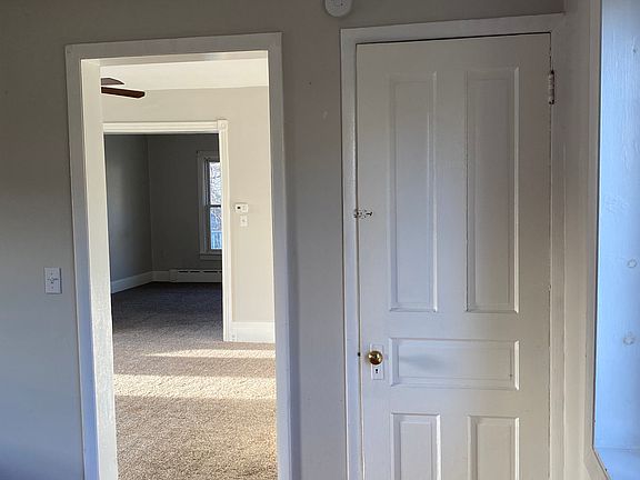 Dining room into living room. Door to full basement