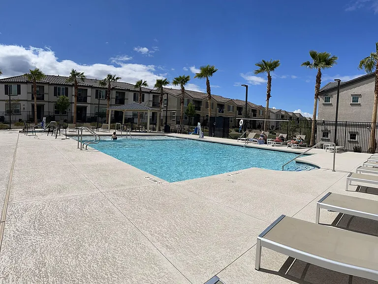 Common pool with tanning ledge, hot tub, sun deck with loungers, showers, water fountains open year round 8am -8pm, and April - Oct until 10pm.