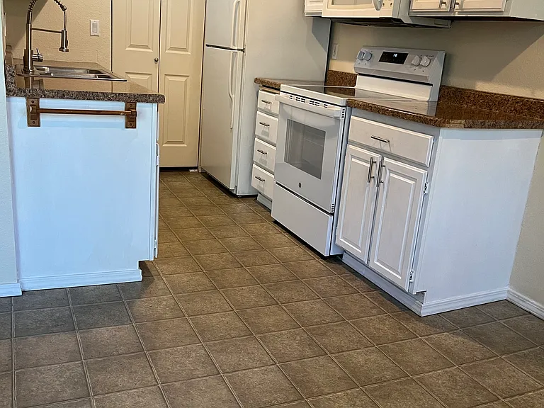 Kitchen with new glass top stove