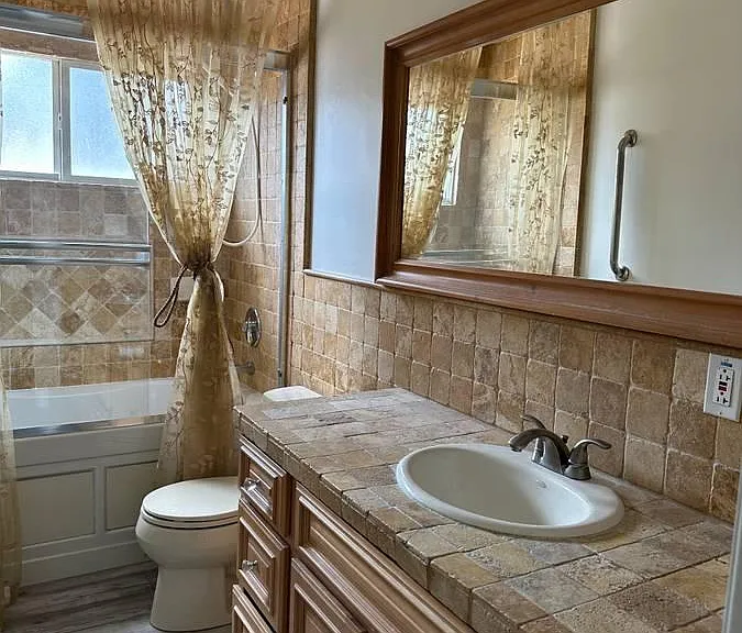 Guest Bathroom and bath.