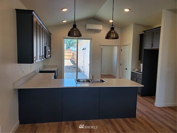 Kitchen of a similar model. Includes simialr finishes, and features are identical.