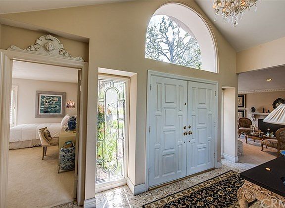Dramatic double-door entry with custom-designed leaded glass panels.