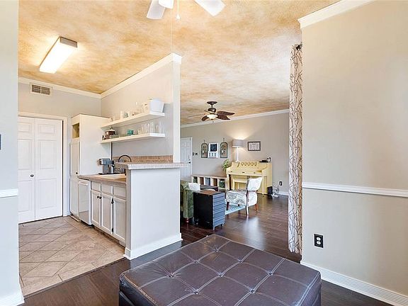 The dining room is adjacent to the kitchen. it has lots of natural light as well.