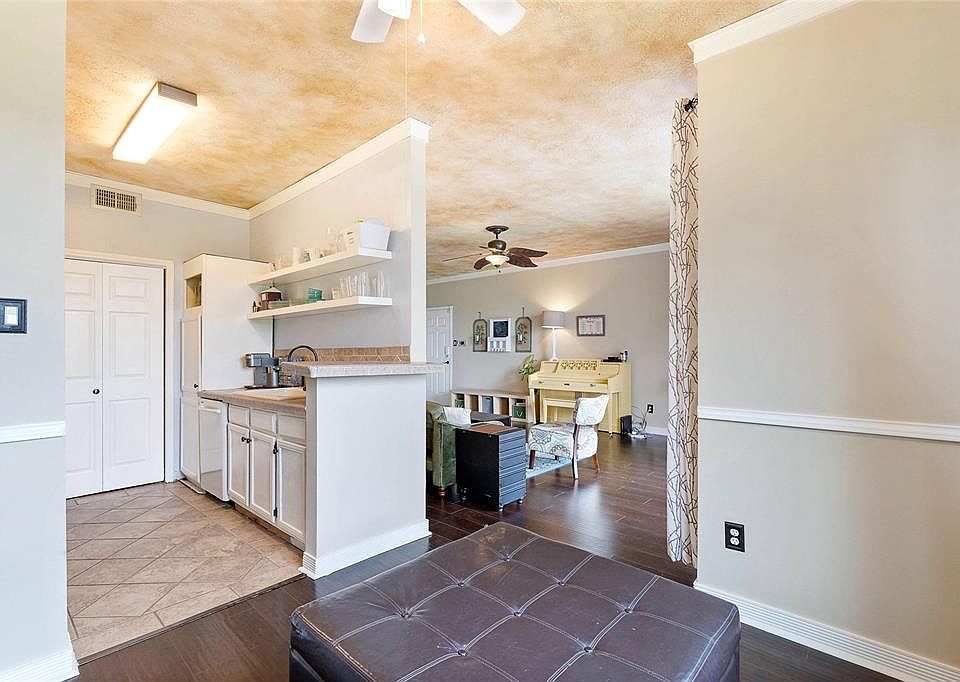 The dining room is adjacent to the kitchen. it has lots of natural light as well.
