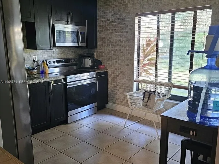 7509 SW 26th Ct — Photo 1