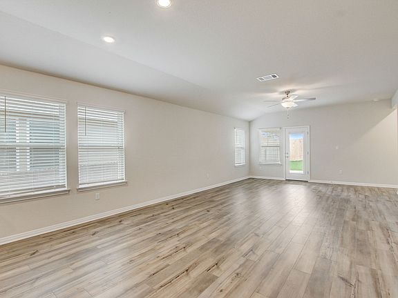 Bring together family and friends in the spacious living and dining areas.