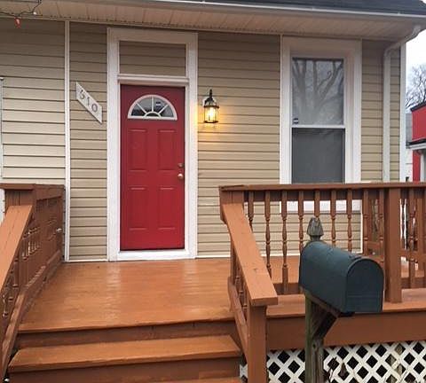 Just painted door, stained desk and installed decorative light.