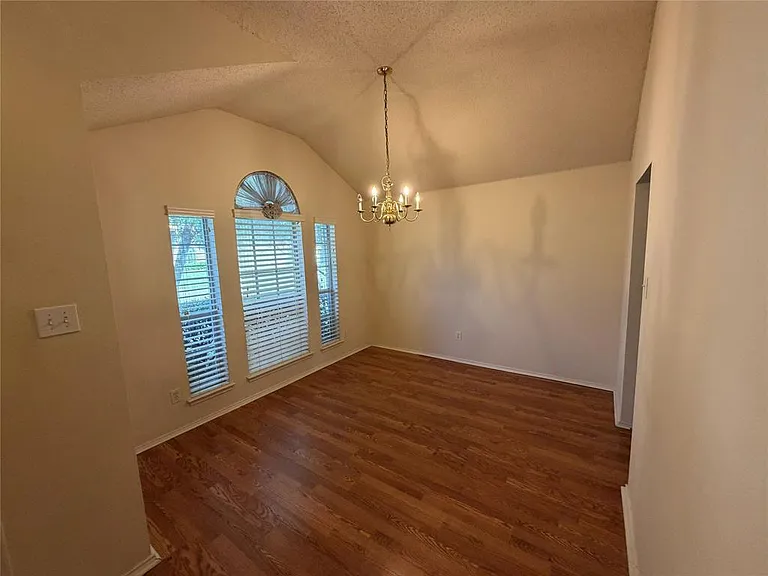 FORMAL DINING WITH ACCESS TO KITCHEN.