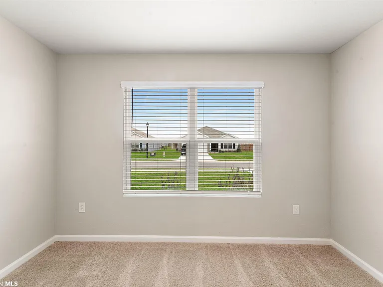 Bedroom 2 (Carpet) with Double window facing street