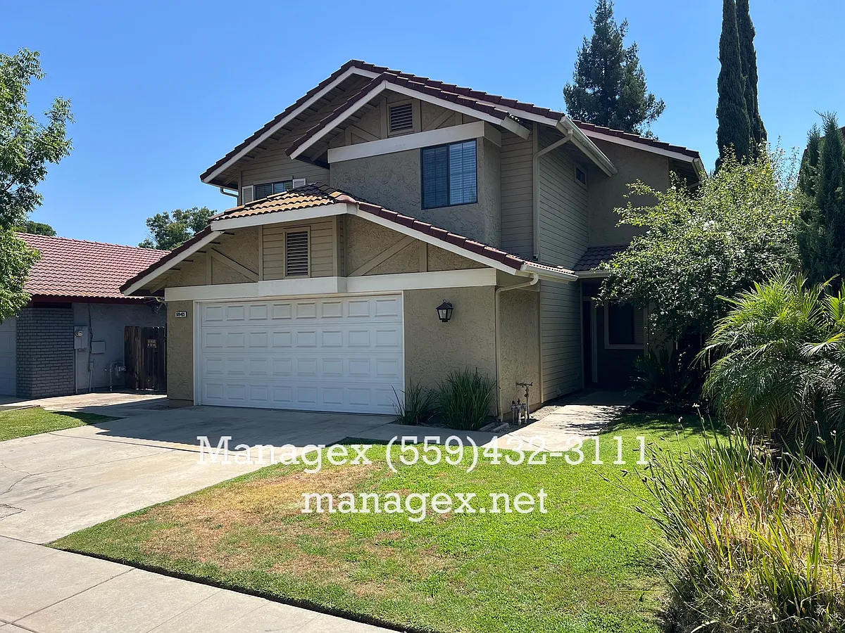 Building Photo - 509 E Alluvial Ave #105