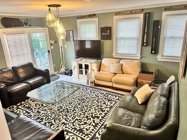 Spacious family room that comfortably sits 8 !