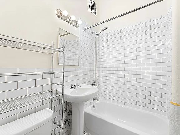 5th image of 445 W 48th St APT 1C