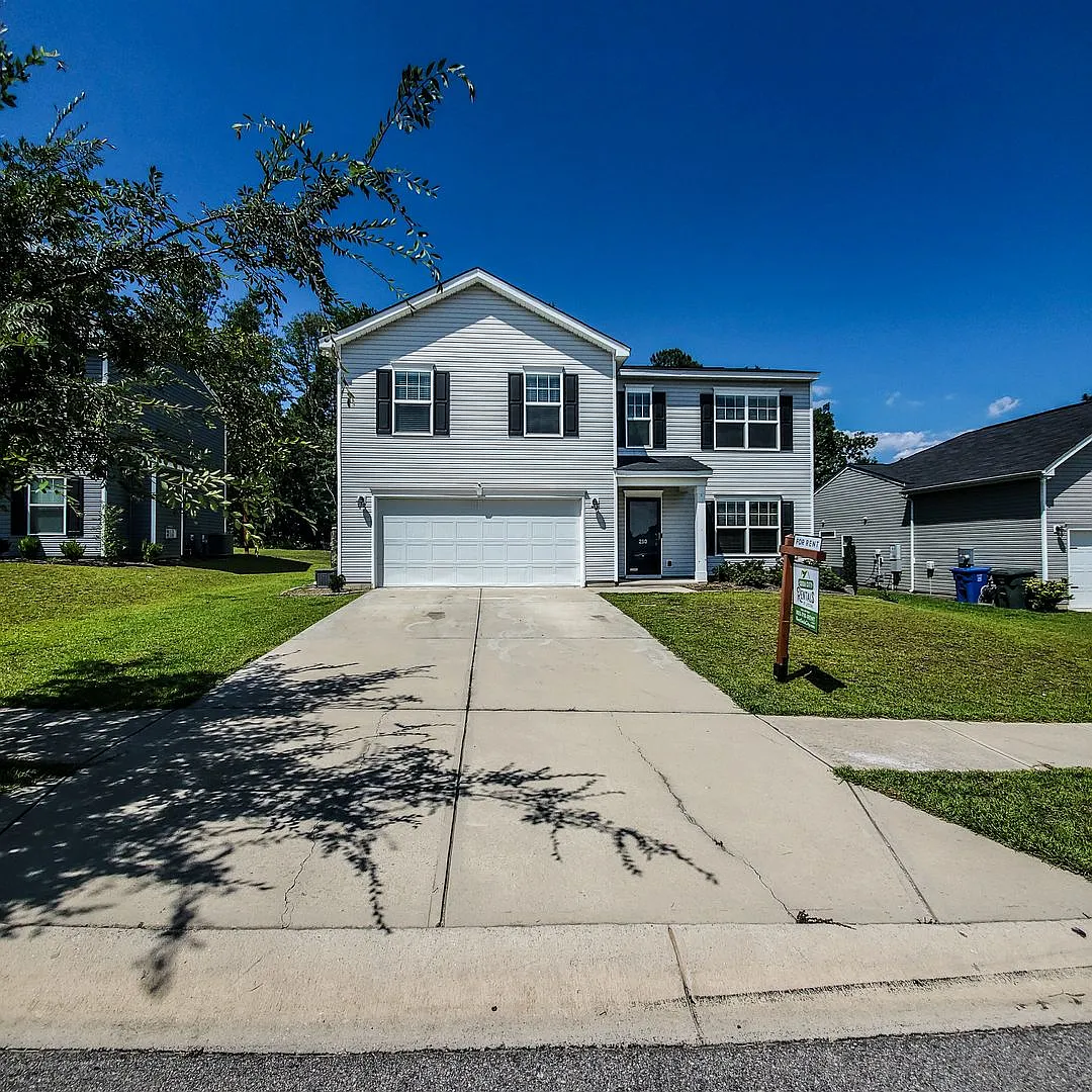Spacious 4 Bedroom Home with Fenced Backyard & 2-Car Garage! — Photo 1