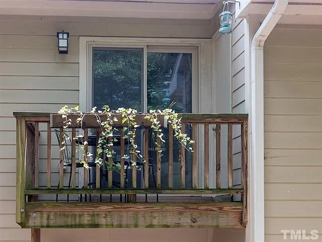 Balcony deck facing north towards Pritchard Park - extra storage unit on right side