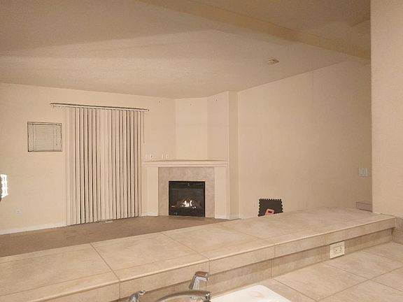 Big living room is about 17 x 17 with sliding door to deck