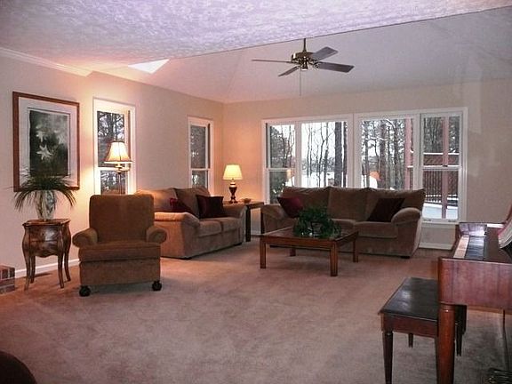 Large spacious family room with view to backyard, open to kitchen.