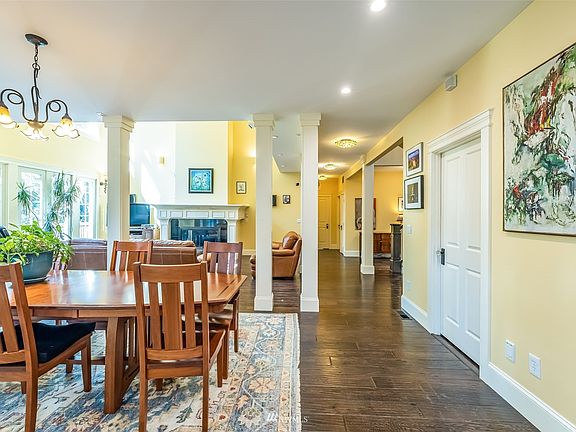 Dining room looking into entry, from the kitchen