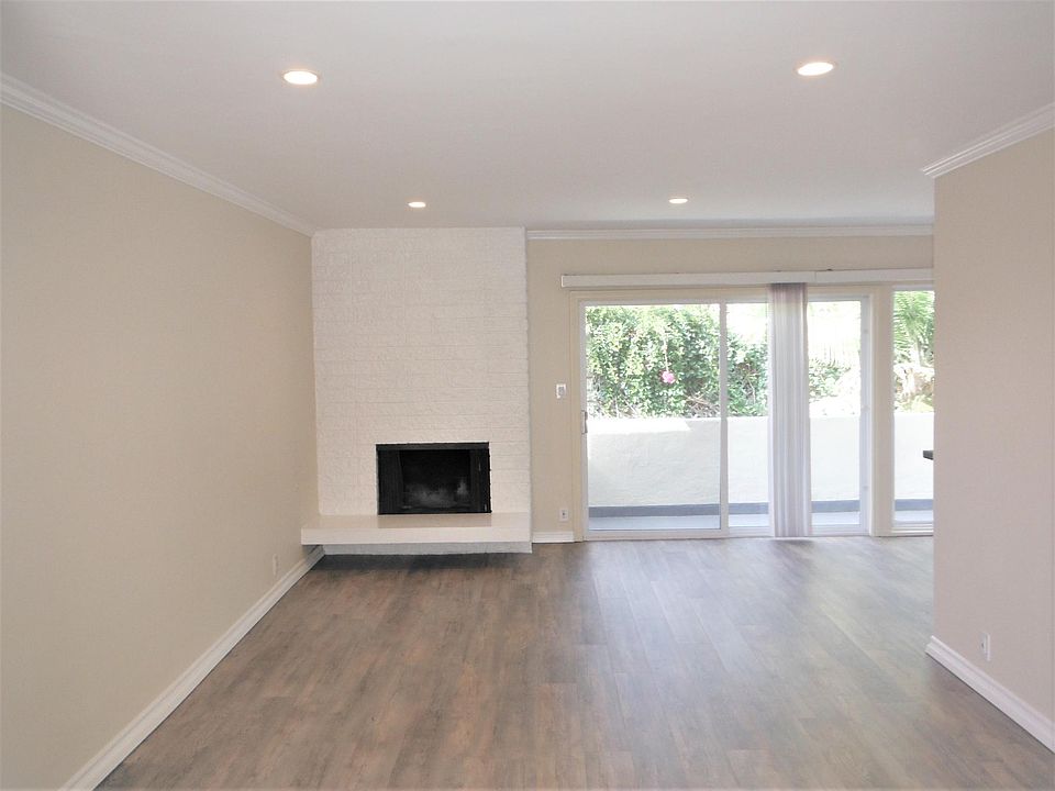 Entrance to Living room with Real wood burning Fireplace!
