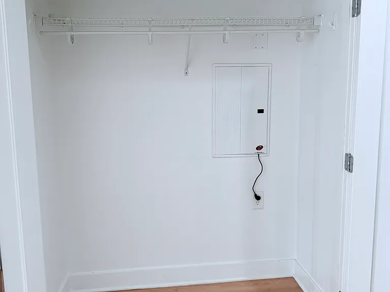 additional closet between living room & kitchen