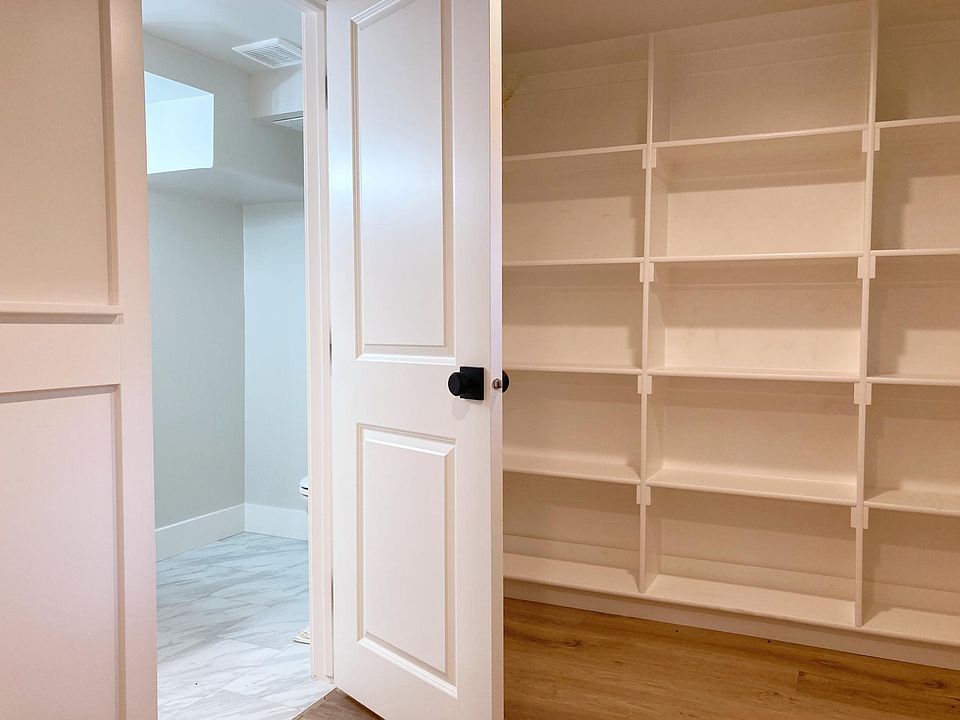 Bathroom and storage area off the entrance.