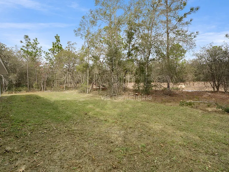 9461 N Sandree Dr — Photo 44