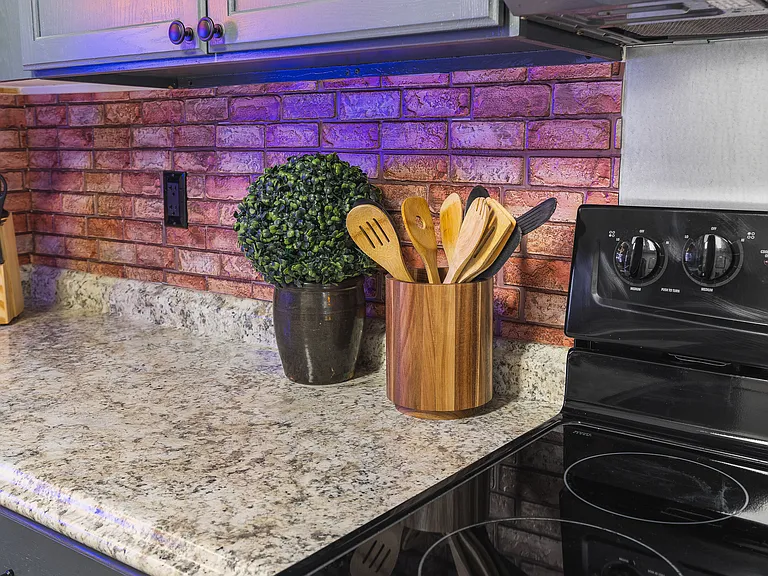 Fully equipped kitchen for all of your cooking needs! Dining table with seating for 4.