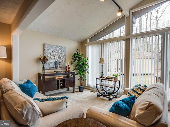 Cathedral ceiling with floor to ceiling windows