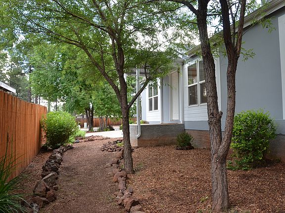 Treed path to backyard