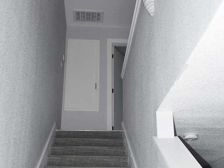 Stairs lead to a linen closet at the top of the stairs, two bedrooms, and one full bathroom