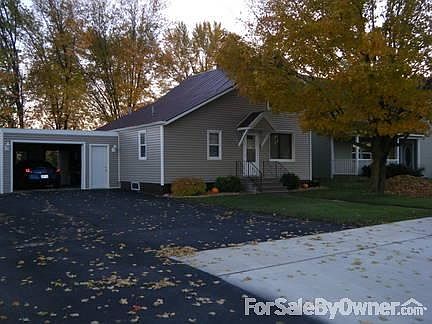 Main Street View
						:
						View from end of driveway on Main street. The driveway has been recently coated
