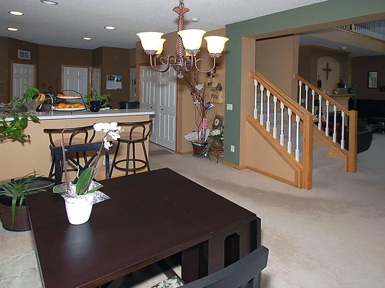View of dining room, kitchen and living room.