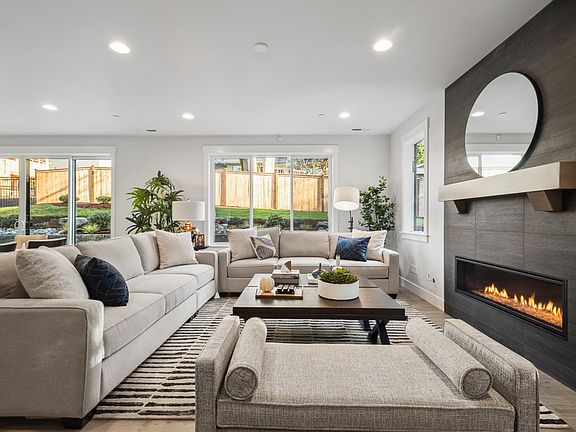 Great room centers around gas fireplace