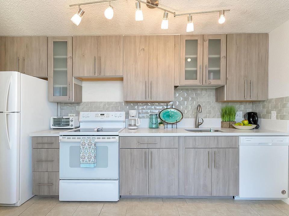 brand new renovated kitchen with dish washer and quartz counter tops