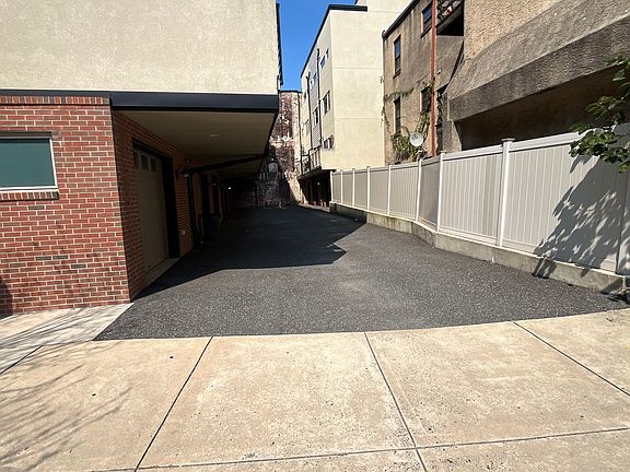 Side street with access to private one-car garage.