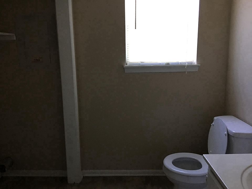 Main floor 1/2 bath with laundry hookups