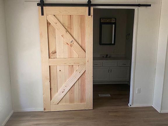 Barndoor from Primary Bedroom to Ensuite Bathroom