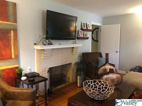 Living room - TV still on the wall for the next tenant.