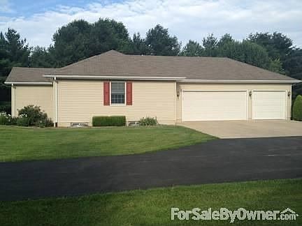 Side
						:
						Facing west w/3 car attached garage