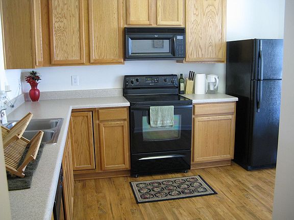 Black appliances in kitchen