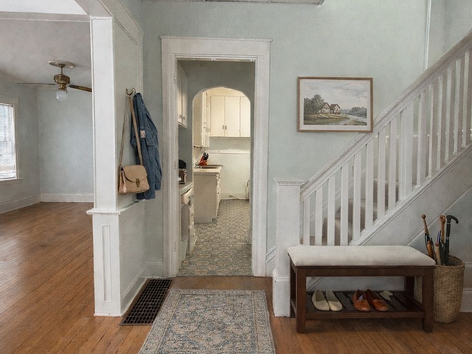 Front entry: living/dining to the left, kitchen straight ahead, half bath and closet to the right.
